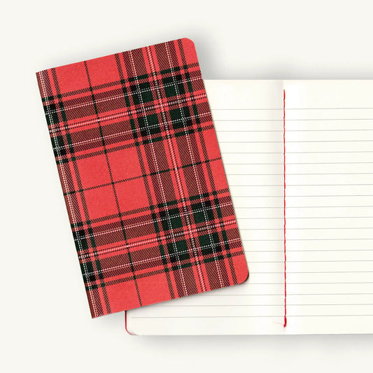 Buffindor's Red tartan notebook with a white lined page on a white background